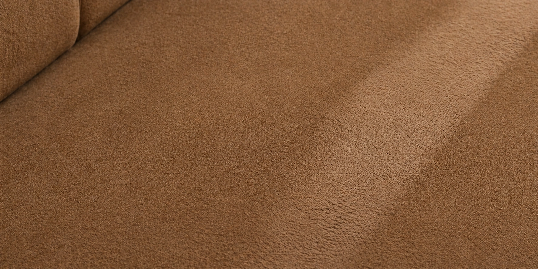 Microfiber sofa showing pet hair resistance properties